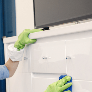4250530b woman with sponge rubber gloves cleaning house 2 Home